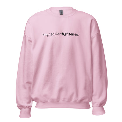 Pink sweatshirt with the phrase "aligned & enlightened." printed on the front, available in color options navy blue, green, maroon, gray, and pink, available in sizes S to 3XL.