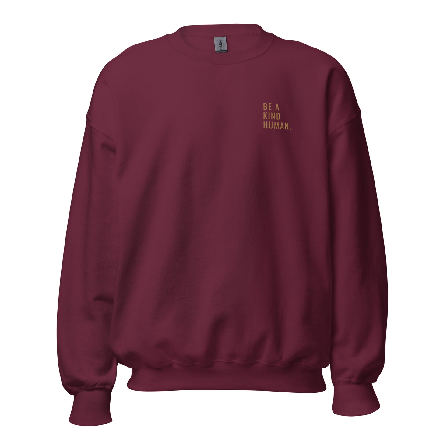 Maroon "Be A Kind Human" premium crew neck sweatshirt with ribbed cuffs, soft fleece lining, and comfortable fit.