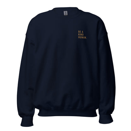 Navy blue "Be A Kind Human" premium crew neck sweatshirt with ribbed cuffs, soft fleece lining, and comfortable fit.