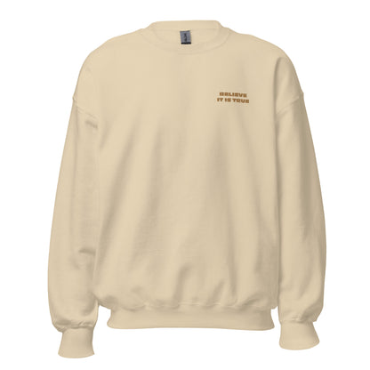 Sand "Believe It Is True" premium crew neck sweatshirt with ribbed cuffs, soft fleece lining, and comfortable fit.