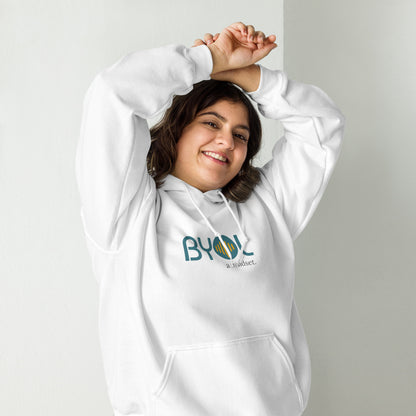 Woman wearing a white BYOL mindset hoodie with color options in black, maroon, olive green, and gray, available in sizes S to 5XL.