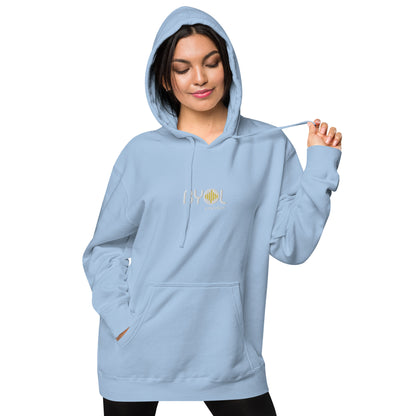 Woman wearing a pigmented blue BYOL mindset hoodie with color options in brown, pink, gray, and green, available in sizes S to 2XL.