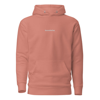 Dusty rose hoodie with 'boundaries' text on the chest.