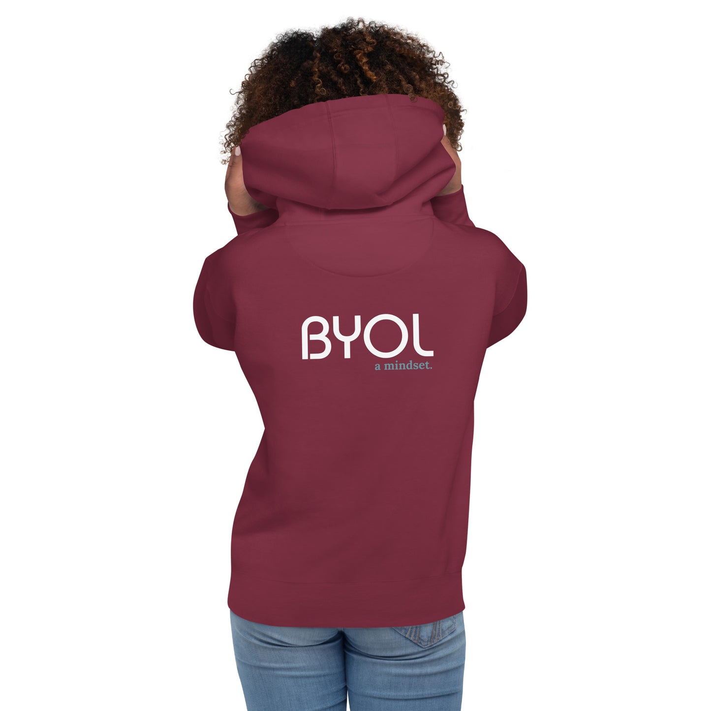 Back view of a woman wearing a maroon BYOL mindset hoodie with color options in black, maroon, dark gray, and light pink, available in sizes S to 3XL.