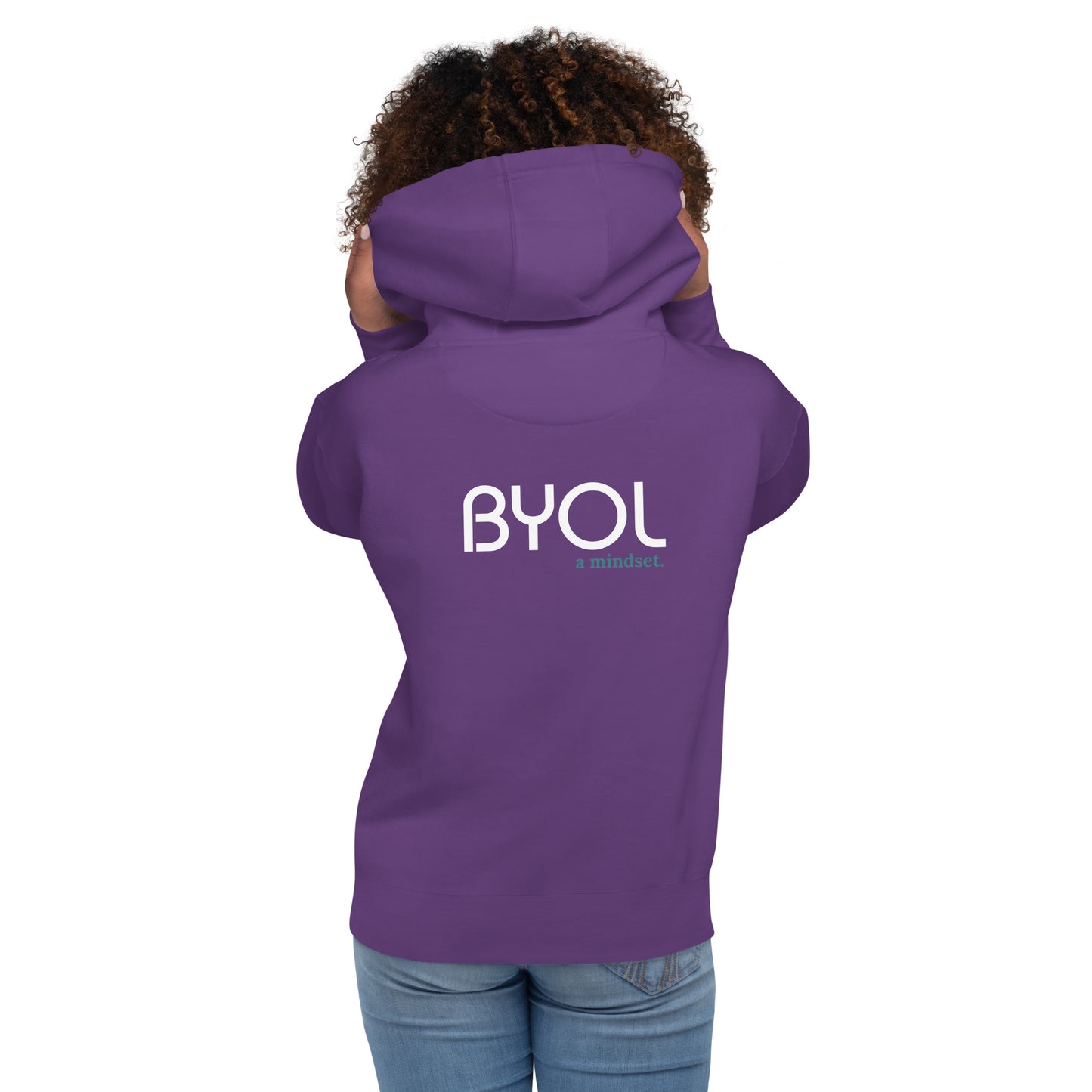 Back view of a woman wearing a purple BYOL mindset hoodie with color options in black, maroon, dark gray, and light pink, available in sizes S to 3XL.