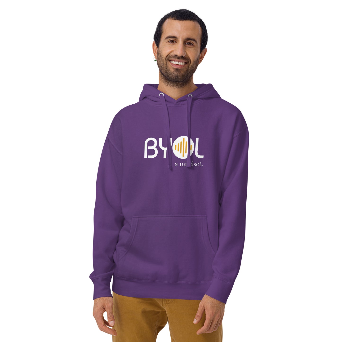 A young man with short hair and a beard wearing a purple "BYOL: a mindset" hoodie, smiling and standing with his arms at his sides. The hoodie features the "BYOL" logo in white and yellow on the front and is available in multiple colors (black, dark gray, maroon, pink, light gray, plus more) and sizes (S-3XL). The "be you out loud" logo is displayed at the top.