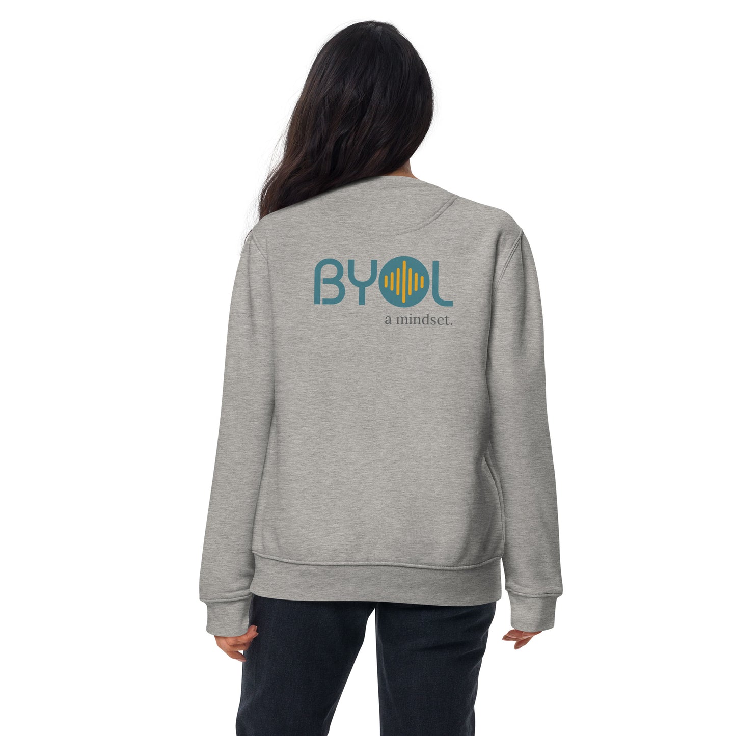 Back view of a woman wearing a light grey BYOL mindset sweatshirt with color options in black, dark gray, pink, and light gray, available in sizes S to 2XL.