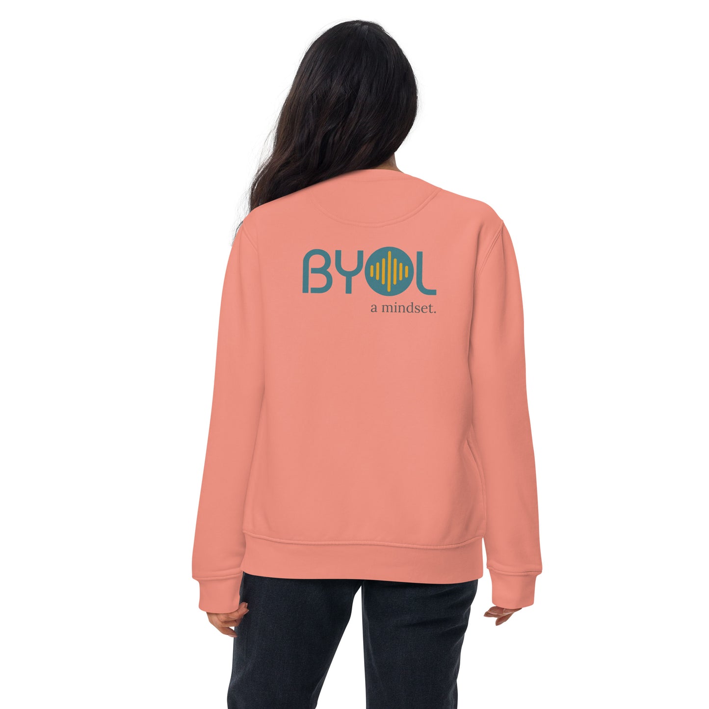 Back view of a woman wearing a dusty pink BYOL mindset sweatshirt with color options in black, dark gray, pink, and light gray, available in sizes S to 2XL.