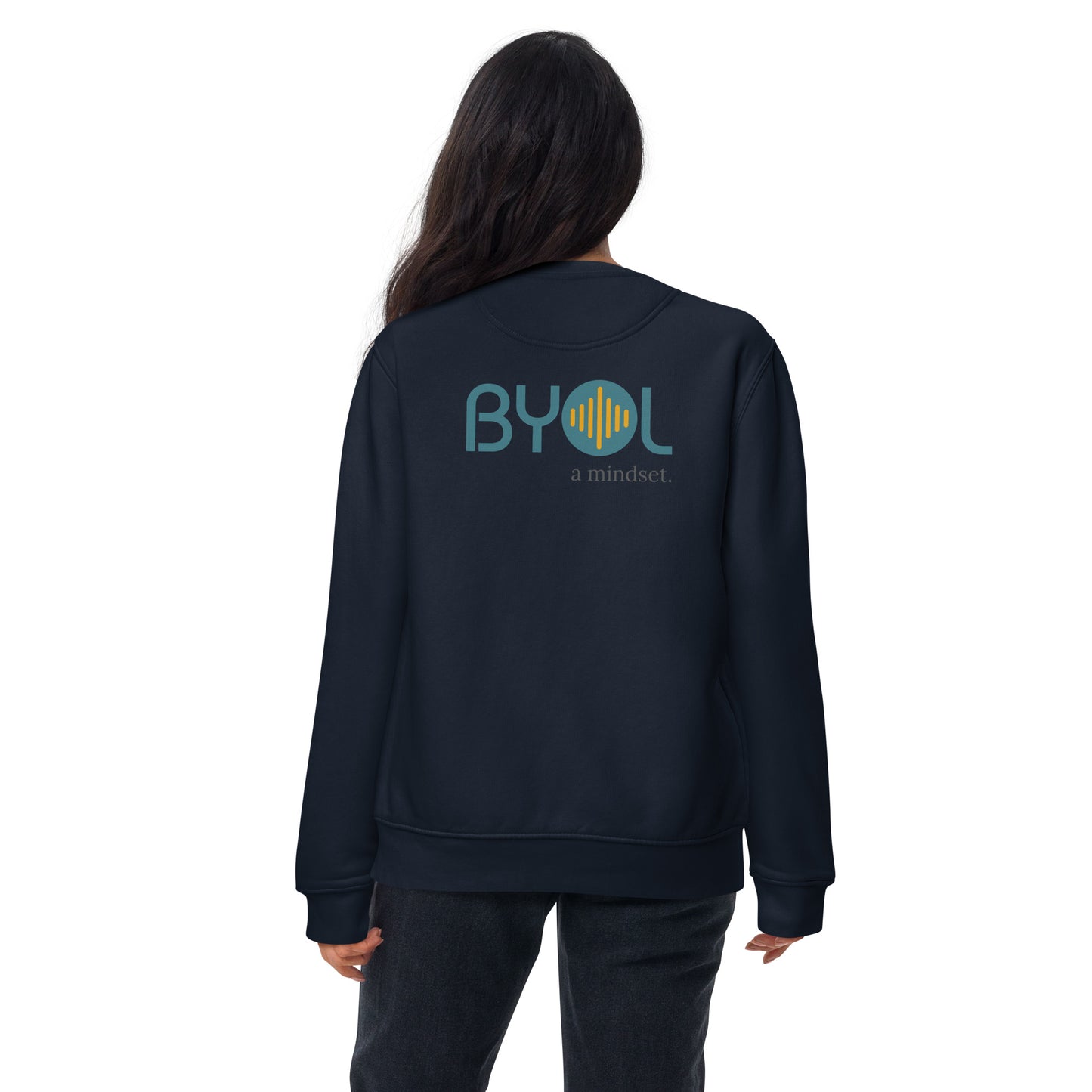 Back view of a woman wearing a navy BYOL mindset sweatshirt with color options in black, dark gray, pink, and light gray, available in sizes S to 2XL.