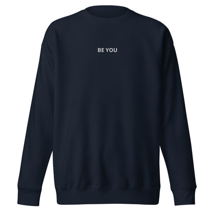 Navy blue embroidered "Be You" premium crew neck sweatshirt with soft fleece interior, ribbed cuffs, and hem.