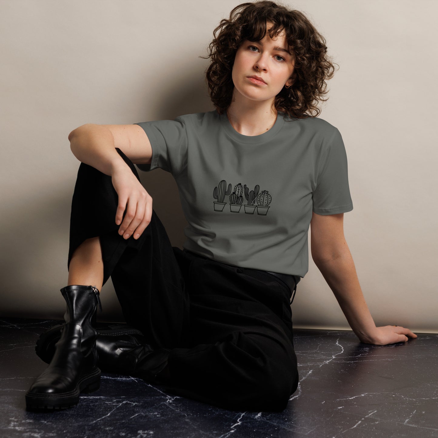 Women's Premium Charcoal Tee featuring a cactus garden design, showcasing a muted illustration of various cacti on a white tee, perfect for nature lovers and subtle self-expression.