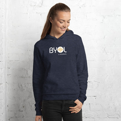 Woman wearing a blue BYOL mindset hoodie with color options in black, navy blue, and gray, available in sizes S to 2XL.