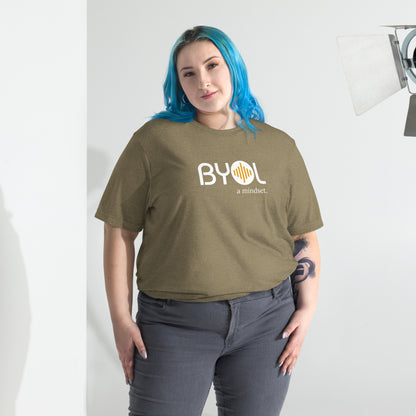 Woman wearing a loose fit BYOL mindset t-shirt in olive triblend with color options in black, red, pink, gray, and yellow, available in sizes S to 3XL.