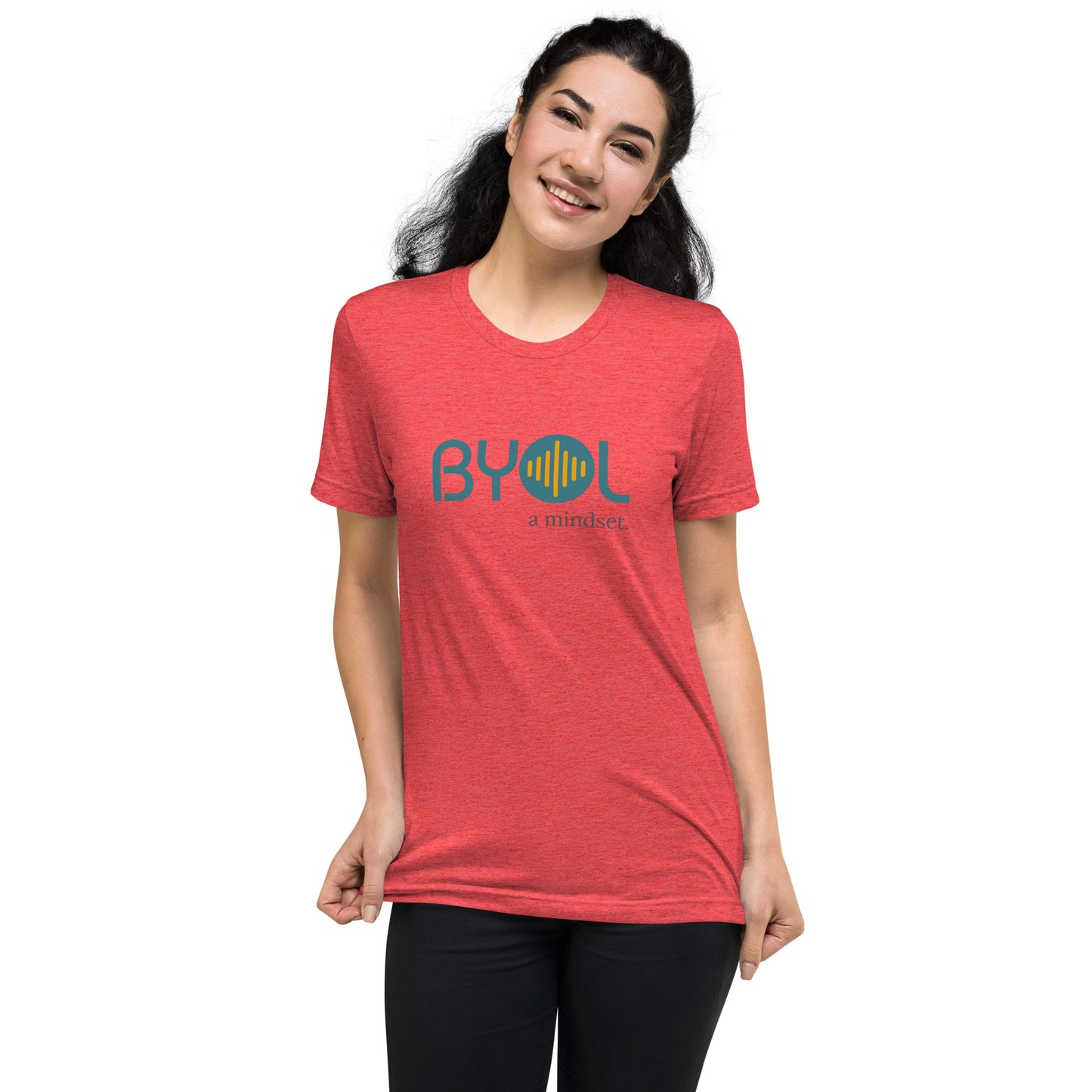 Woman wearing a red triblend BYOL mindset t-shirt with color options in black, red, pink, gray, and yellow, available in sizes S to 3XL.