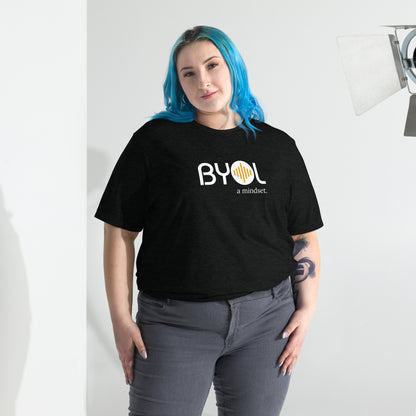 Woman wearing a loose fit BYOL mindset t-shirt in black triblend with color options in black, red, pink, gray, and yellow, available in sizes S to 3XL.