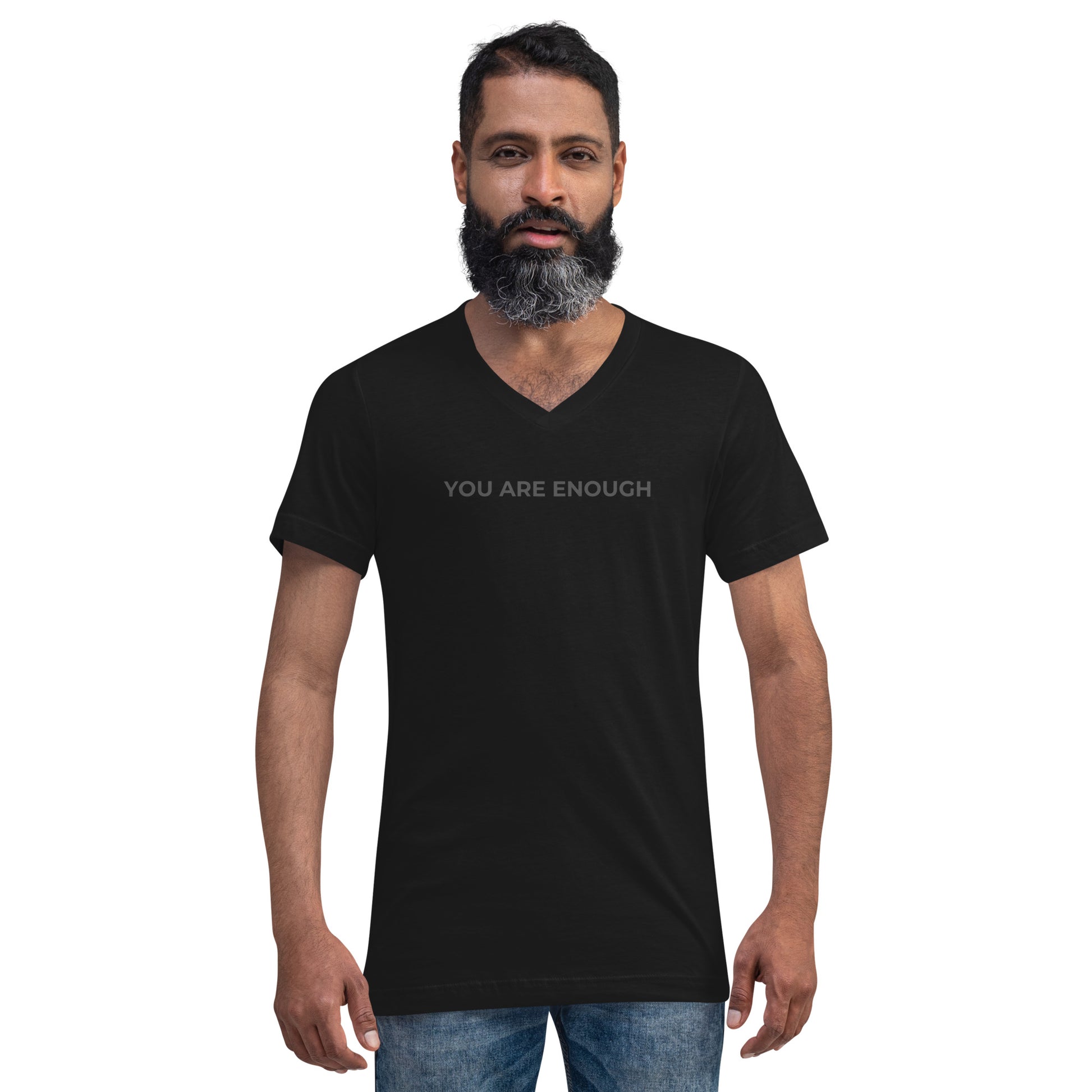 Man with a beard wearing a black v-neck tee with the text "You Are Enough".