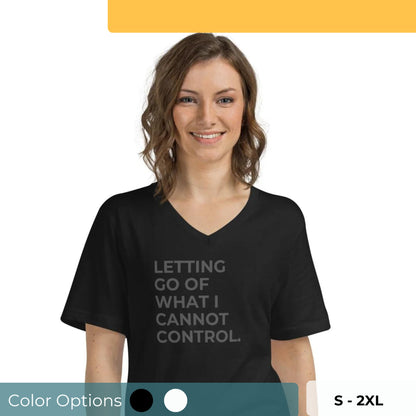 Woman wearing a black V-neck tee with "Letting Go of What I Cannot Control" text, available in black and white, sizes S-2XL.