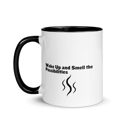 White ceramic mug with black inside and handle that says, "wake up and smell the possibilities"