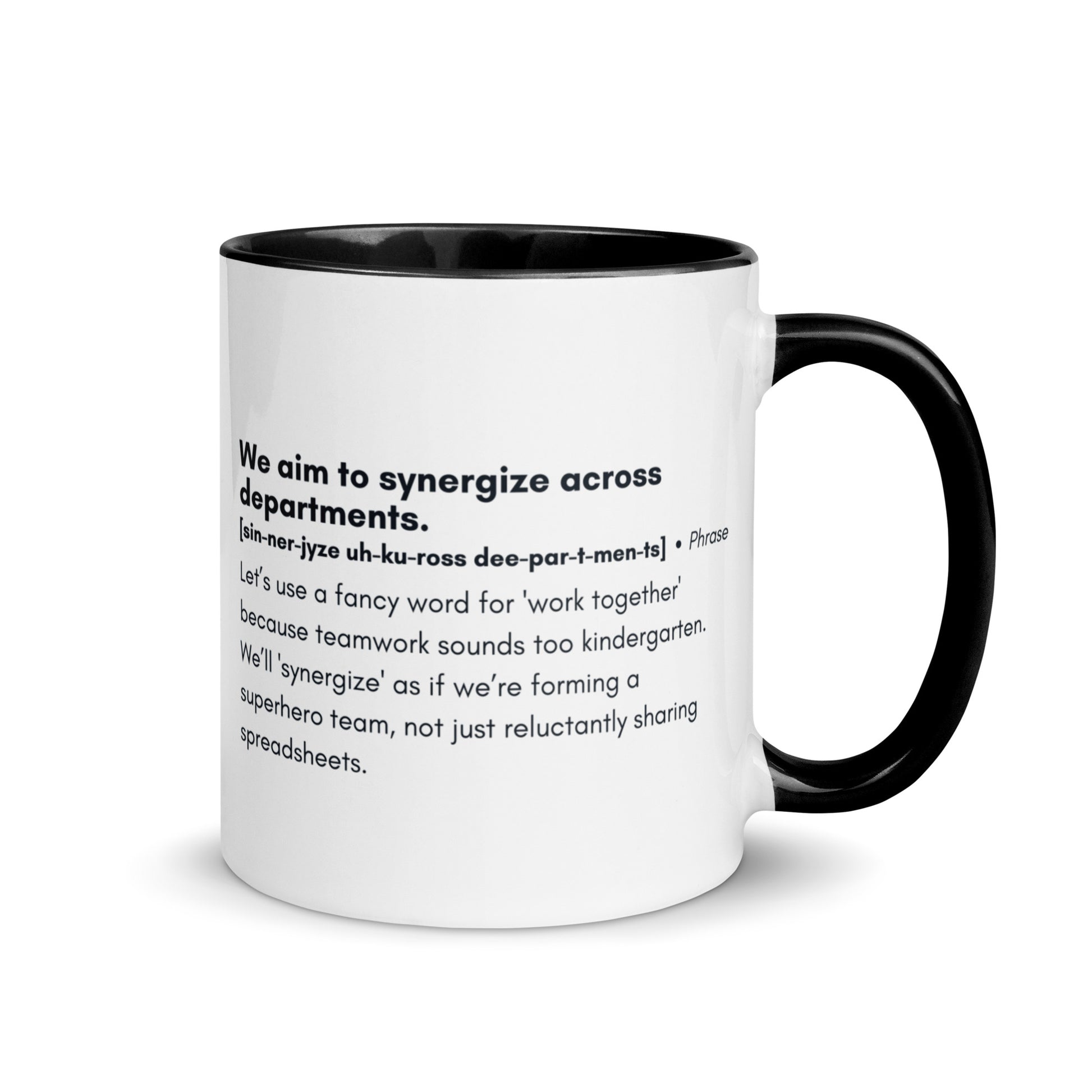 White ceramic mug with black inside and handle with word,"We aim to synergize across departments" followed by a humorous definition.