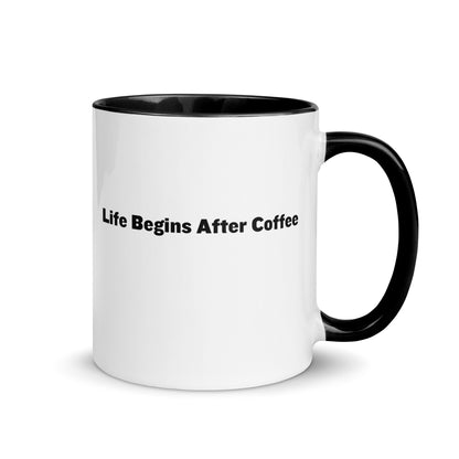 White ceramic mugs with black  inside and handle with the words, "Life begins after coffee"