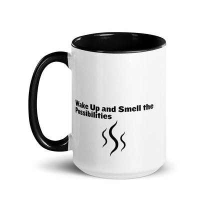 White ceramic mug with black inside and handle that says, "wake up and smell the possibilities"