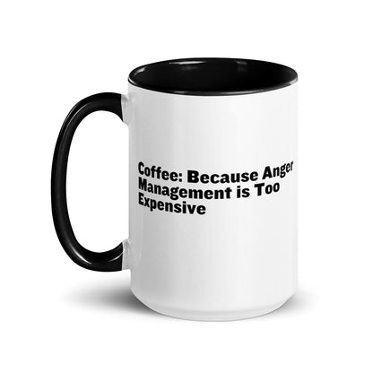 White ceramic mug with black inside and on the handle with the words, "Coffee: Because Anger management is too expensive"