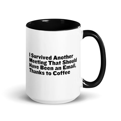 White ceramic mug with black inside and on the handle with words that say, "I survived another meeting that should have been an email, thanks to coffee"