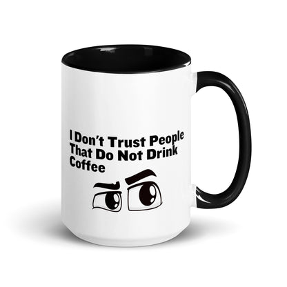 White ceramic mud with black on the inside and on the handle with the words, "I don't trust people that do not drink coffee"