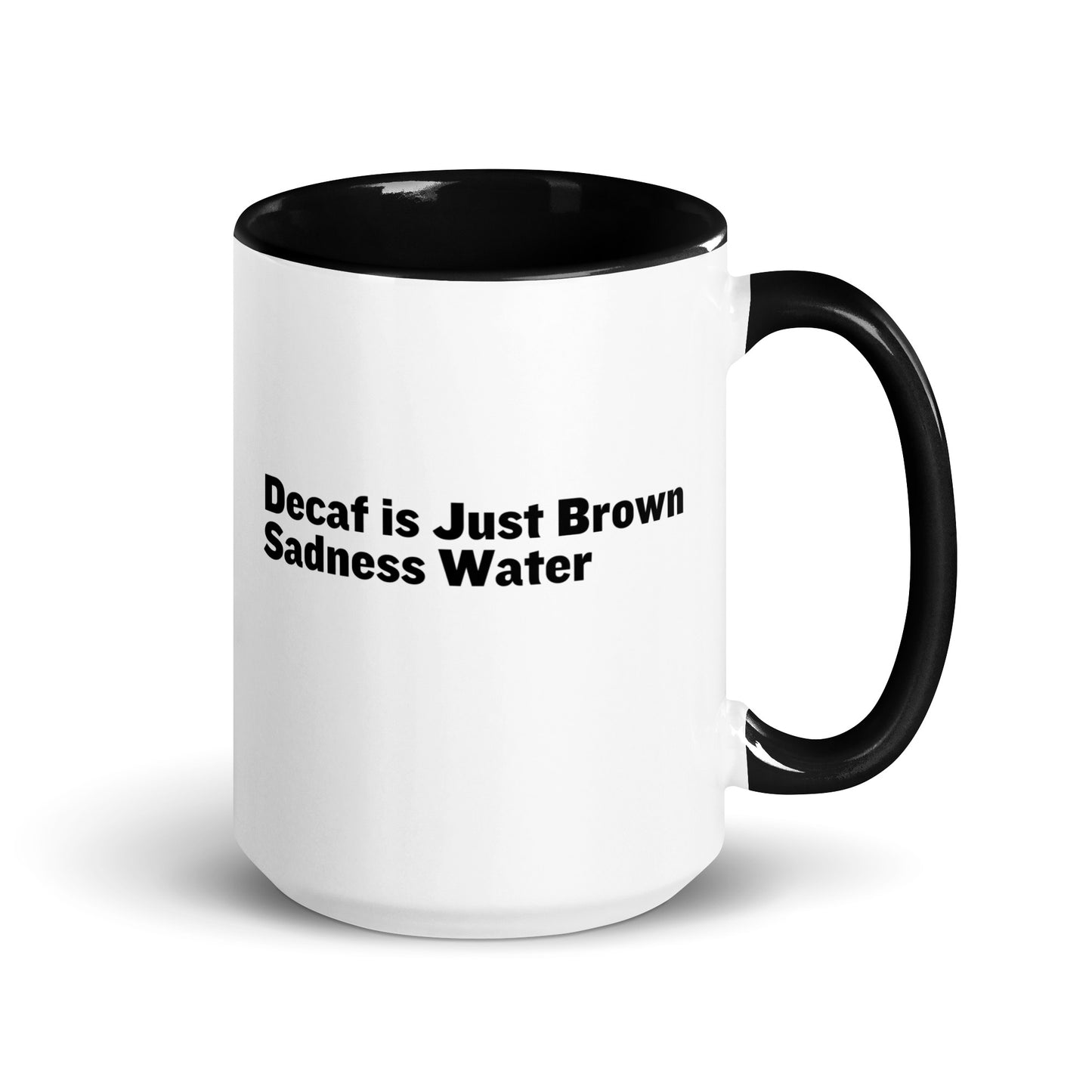 White ceramic mug with a black inside and handle with the words, "Decaf is just Brown Sadness water"