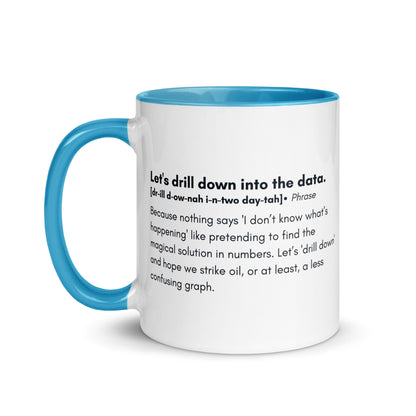 White ceramic mug with light blue inside and handle with the words, "Let's drill down into the data" followed by a humorous definition.