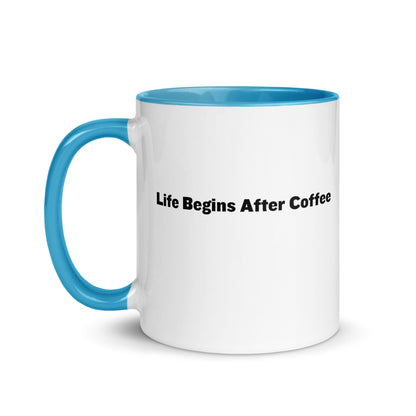 White ceramic mugs with light blue inside and handle with the words, "Life begins after coffee"