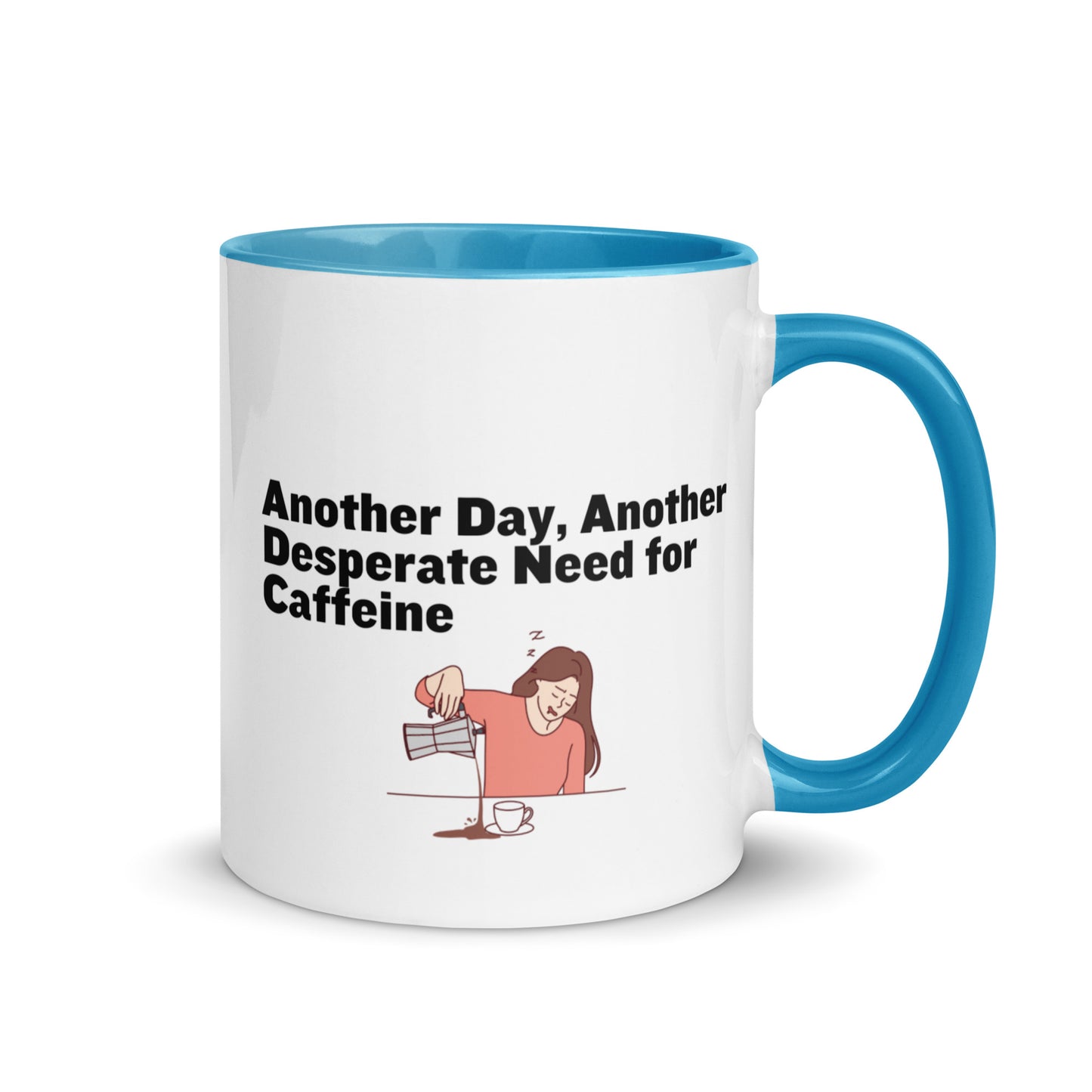 White ceramic coffee mug with light blue inside and handle with the words, "Anotehr day, another desperate need for caffeine" 