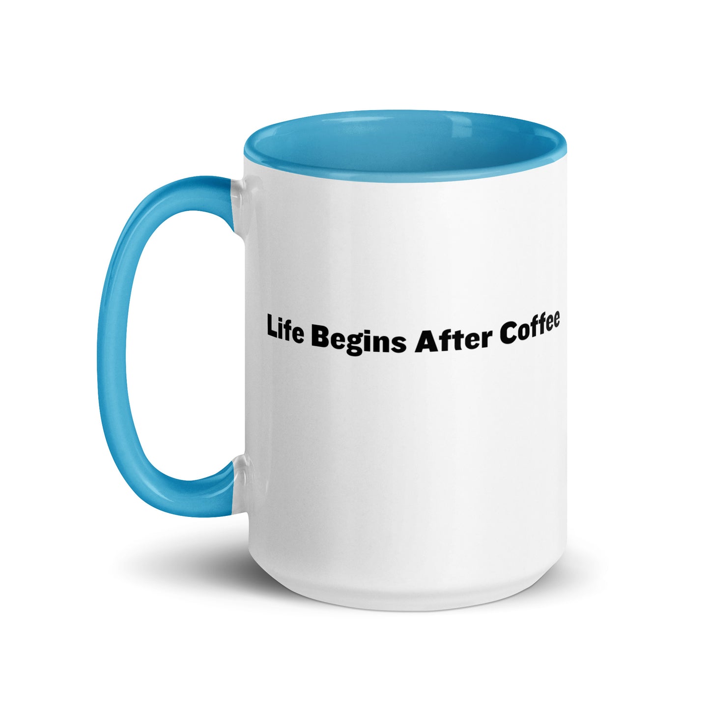 White ceramic mugs with light blue inside and handle with the words, "Life begins after coffee"