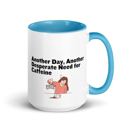 White ceramic coffee mug with light blue inside and handle with the words, "Anotehr day, another desperate need for caffeine" 