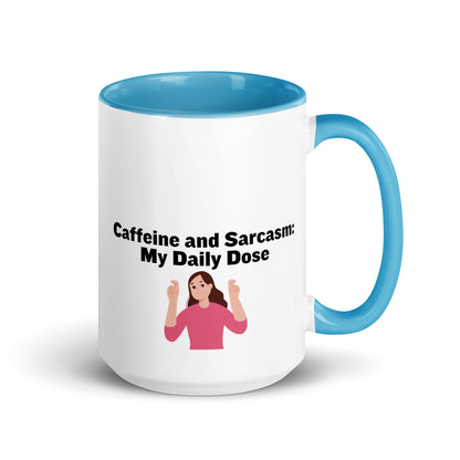 White ceramic mug with light blue on the inside and on the handle with words that say, "Caffeine and Sarcasm: My daily dose"