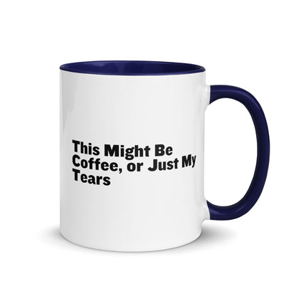 White Ceramic mug with blue on the inside and handle with the words, "This might be coffee or just my tears"