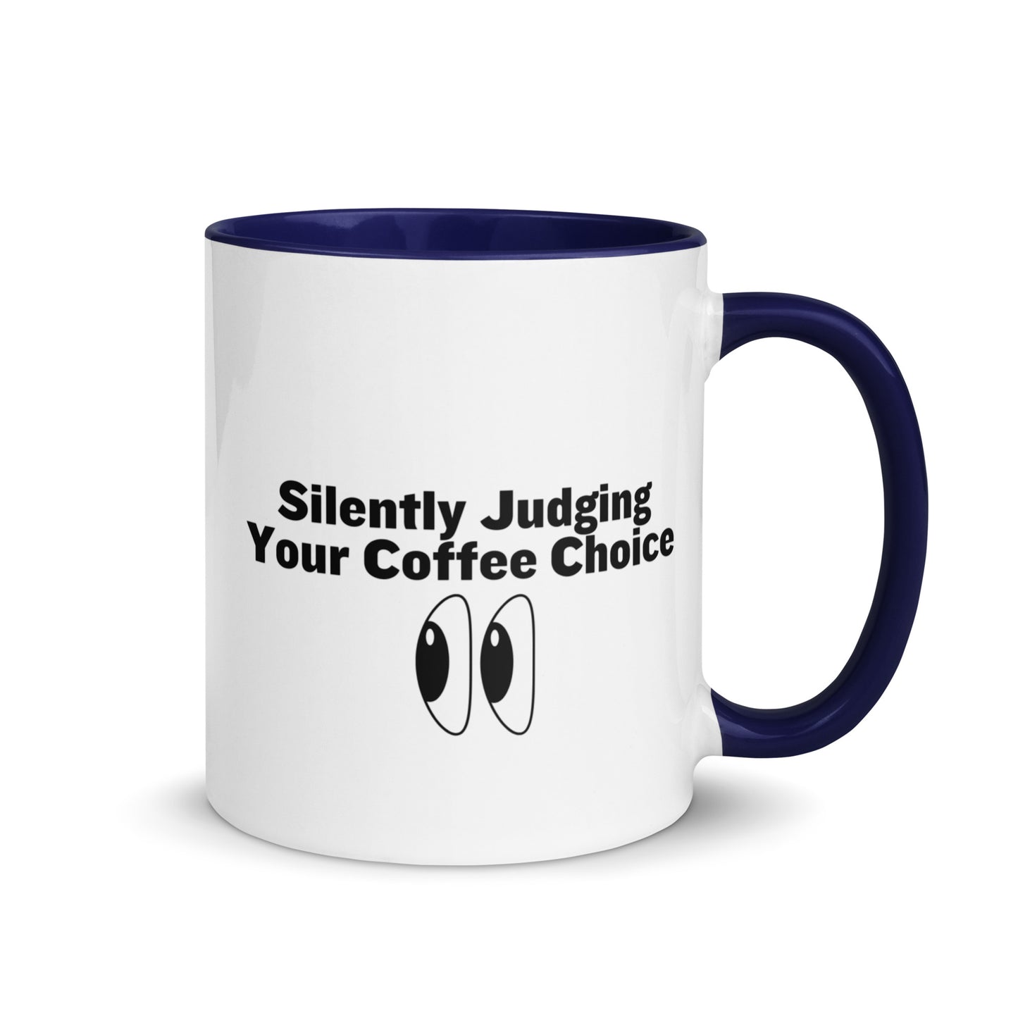 White ceramic mug with blue inside and handle with the words, "Silently judging your coffee choice"