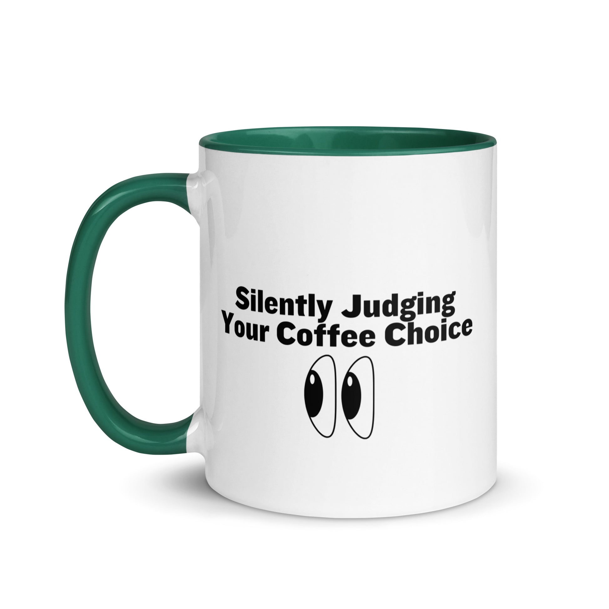 White ceramic mug with green inside and handle with the words, "Silently judging your coffee choice"