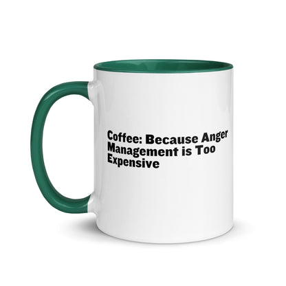 White ceramic mug with green inside and on the handle with the words, "Coffee: Because Anger management is too expensive"