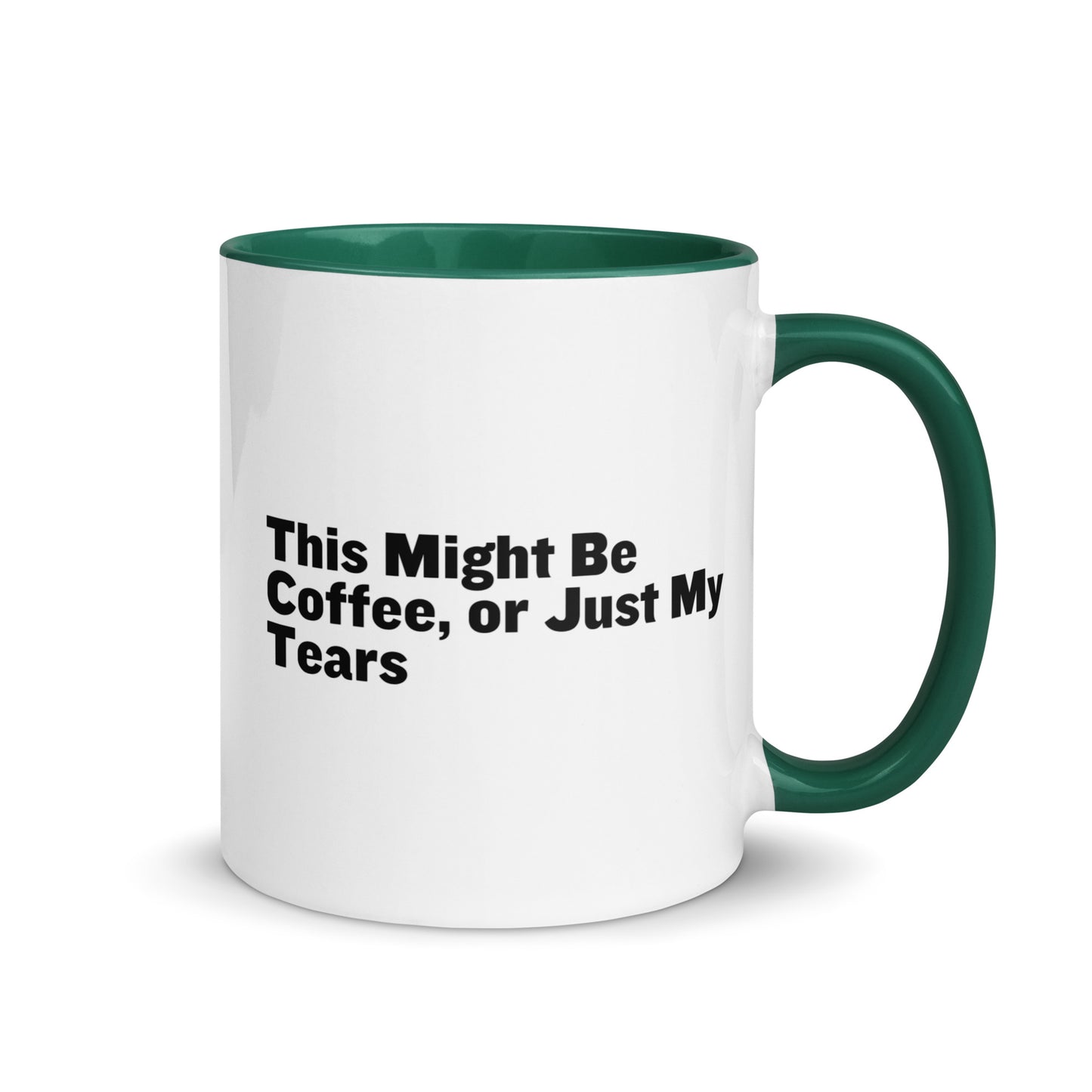 White Ceramic mug with green on the inside and handle with the words, "This might be coffee or just my tears"