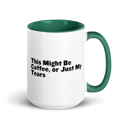 White Ceramic mug with green on the inside and handle with the words, "This might be coffee or just my tears"