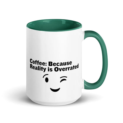 White ceramic mug with green on the inside and on the handle with the words, "Coffee: Because reality is overrated"