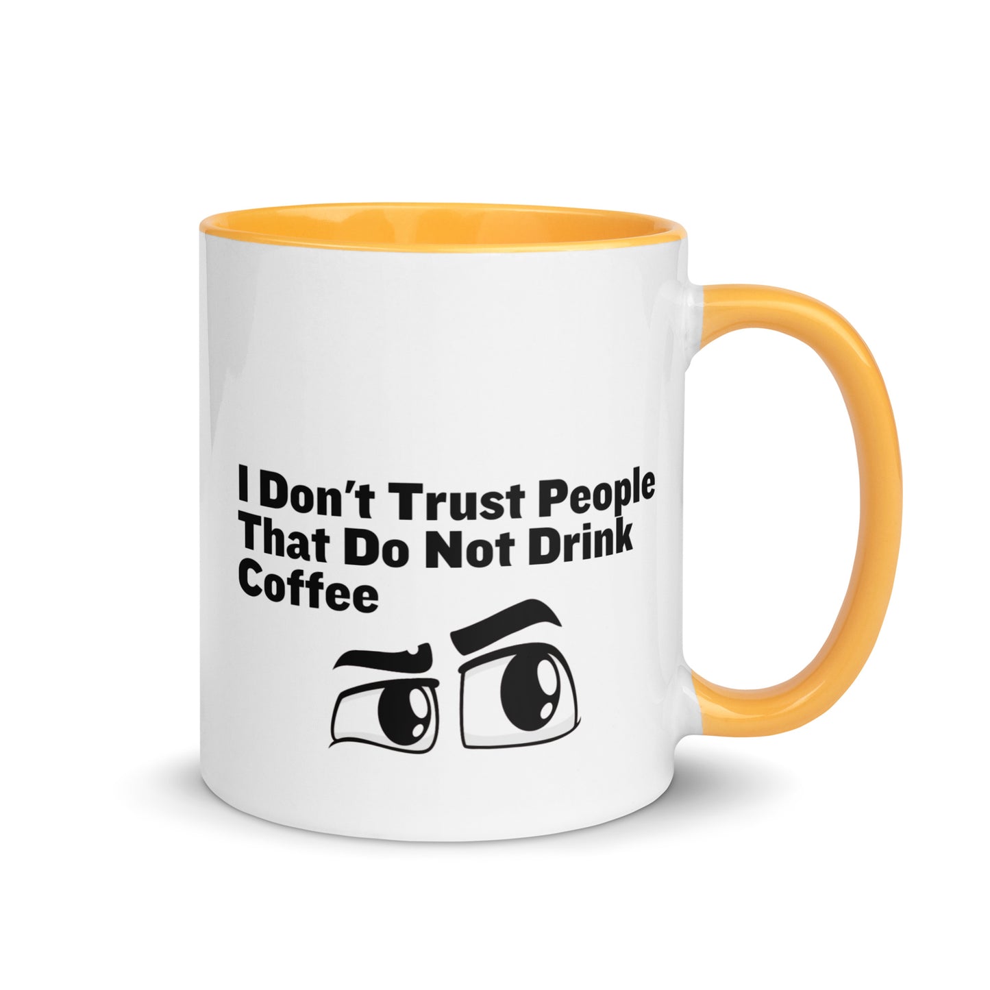 White ceramic mud with golden yellow on the inside and on the handle with the words, "I don't trust people that do not drink coffee"