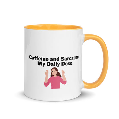 White ceramic mug with golden yellow on the inside and on the handle with words that say, "Caffeine and Sarcasm: My daily dose"