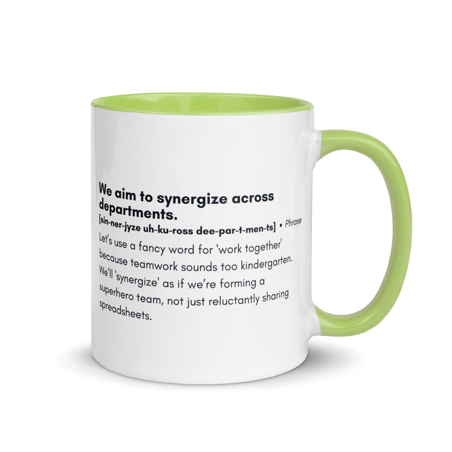 White ceramic mug with light green inside and handle with word,"We aim to synergize across departments" followed by a humorous definition.