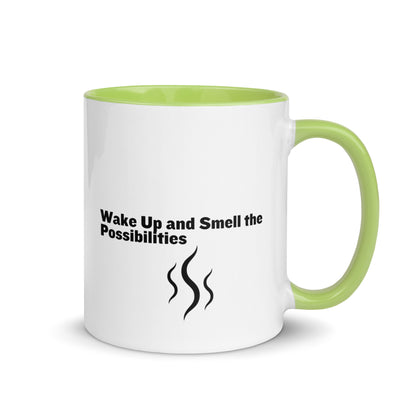 White ceramic mug with lime green inside and handle that says, "wake up and smell the possibilities"