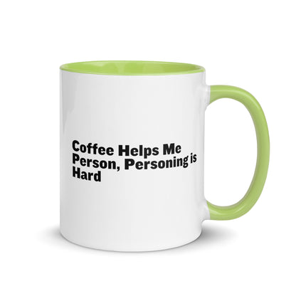 White ceramic mug with lime green inside and on the handle with the words, "Coffee helps me person, personing is hard"