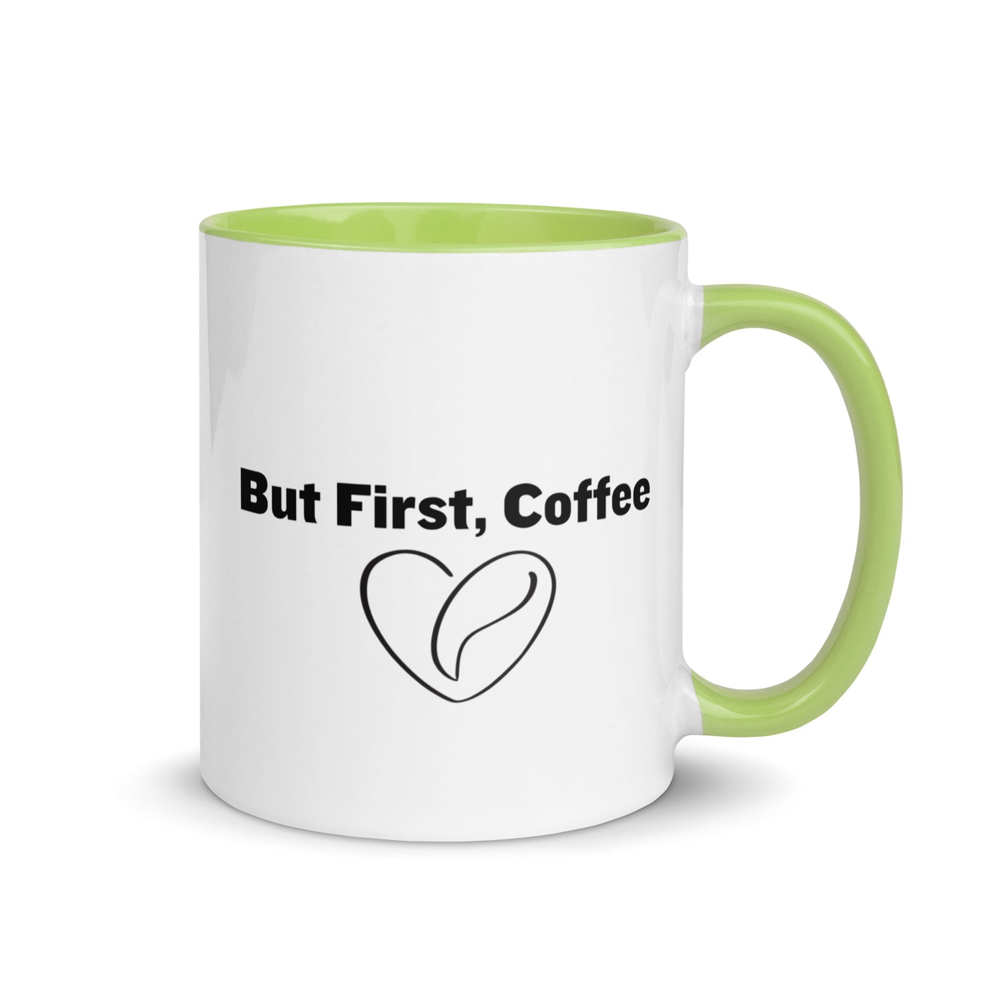 White ceramic mug with lime green on the inside and on the handle with words that say, "But first, coffee"