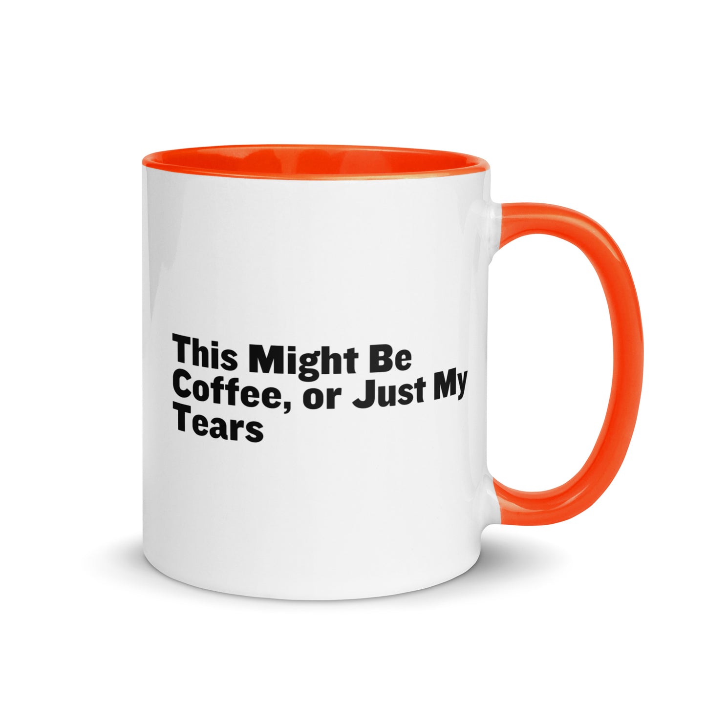 White Ceramic mug with orange on the inside and handle with the words, "This might be coffee or just my tears"