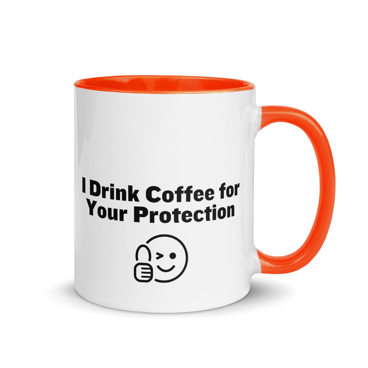 White ceramic mug that is orange inside and on the handle with the words, "I drink coffee for your protection"